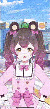 a girl in a pink dress has a teddy bear headband