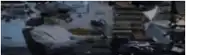 a blurry picture of a man sitting at a desk using a laptop computer .