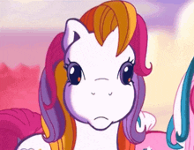 a cartoon pony with a pink and orange mane and tail
