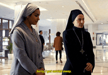 a nun says sorry i get carried away in a hallway