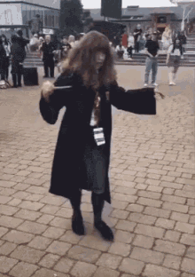 hermione cosplay vouging in costume