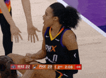 a basketball game is being played between the phoenix suns and the denver nuggets