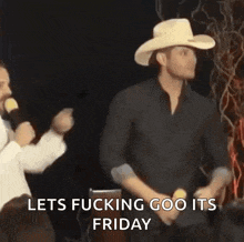 a man in a cowboy hat is dancing with a microphone in his hand and says let 's fucking goo its friday .