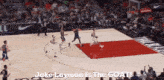a basketball game is being played and the words " jake layman is the goat " are on the screen