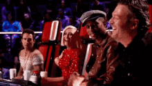 Laughing Squad GIF - The Voice Adam Levine Pharrell GIFs