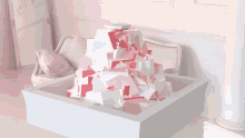 a white table with a sculpture on it that looks like a pyramid