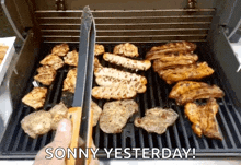 a grill with tongs and the words sonny yesterday written on it