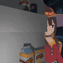 a box of orange juice sits on a shelf