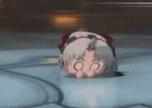 a cartoon character is laying on her back on the floor .
