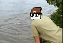 a pixel art drawing of a man with a witch hat on his head