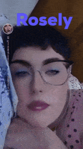 a close up of a woman 's face with the name rosely on the top