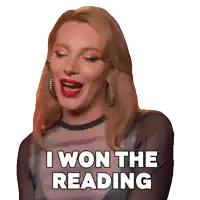 a woman says i won the reading with a sticker on her face