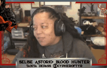 a woman wearing headphones with the name selise astoria blood hunter on the bottom