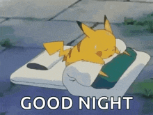 a pikachu is sleeping on a bed with the words `` good night '' written on the bottom .