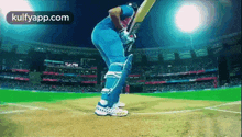 a cricket player is swinging a bat at a ball while standing on the field .