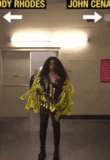 a woman in a costume is standing in front of a sign that says john cena