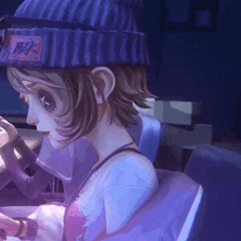 a girl wearing a purple hat with a patch that says bb