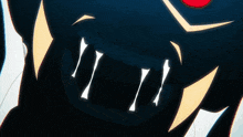 a close up of a cartoon character 's mouth with sharp teeth