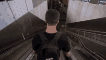 a man wearing a backpack that says sunny on the back