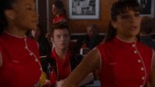 a man in a red shirt has a name tag that says ruff on it