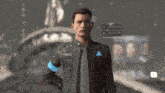 a man wearing a jacket that says x800 stands in front of a crowd