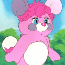 a pink teddy bear with blue eyes and a gray nose