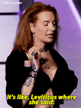 a woman in a black top is talking about leviticus where she said