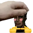 a person is putting a hat on a man 's head with their hand .
