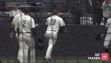 a baseball player with the number 28 on his shirt