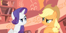 a cartoon of rarity and applejack from my little pony standing next to each other