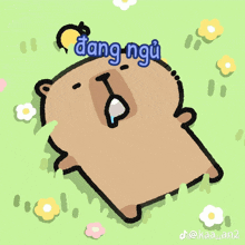 a drawing of a bear laying in the grass with the words " dang ngu " above him
