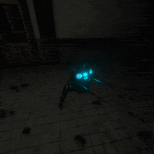 a glowing blue spider is sitting on a tiled floor