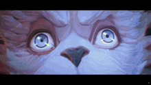 a close up of a cat 's face with a very angry look on its face