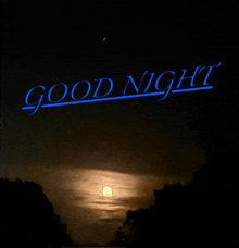a picture of a full moon with the words good night on it