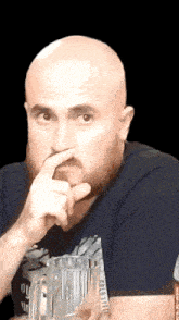 a bald man with a beard wearing a shirt that says ' california '