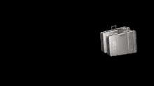 two silver suitcases with the numbers s17-5 on them