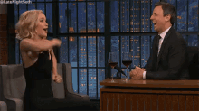 seth meyers late night seth meyers laughing jennifer lawrence running in place