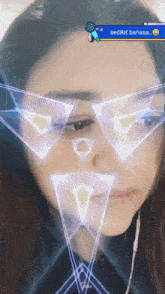 a woman 's face is displayed with a speech bubble that says sedikit bahasa on it