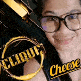 a woman wearing glasses is smiling in front of a sign that says " clique cheese "
