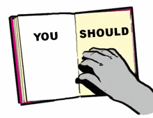 a hand is holding an open book with the word fort on the front