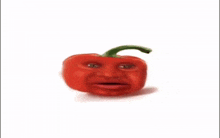 a red pepper with a face on it 's head