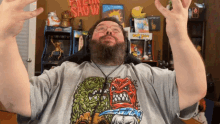 a man wearing headphones and a shirt that says five in show on it