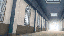 a hallway with a ceiling that has a skylight on it