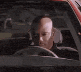 a man in a black shirt has a badge on his shoulder that says police