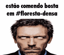 a close up of a man 's face with the words estao comendo bosta em #floresta-densa