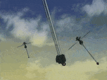 a bunch of antennas are flying in the air