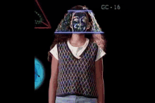 a woman wearing a plaid shirt is being measured by a computer