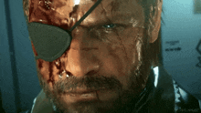 a close up of a man 's face with a bloody eye patch and the letters mme on the bottom