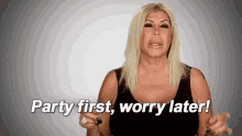 a woman is holding a key and saying `` party first , worry later '' .