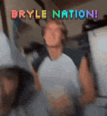 a blurry picture of a person with the words bryle nation written above it
